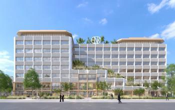 Exterior view of a modern office building at Marten Meesweg 101, Rotterdam Alexander, with people walking outside. Ideal location for office space rental.