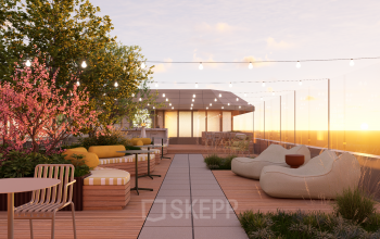 Rooftop terrace at Marten Meesweg 101, Rotterdam Alexander, featuring seating arrangements, plants, and string lights, ideal for office space rental with a scenic view.