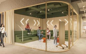 Modern office space at Marten Meesweg 101, Rotterdam Alexander, featuring a stylish interior with a seating area and people engaged in conversation. Ideal for office space rental.