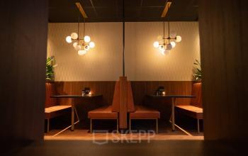 Cozy office space available for rent featuring intimate seating areas with stylish lighting and decor at George Hintzenweg 77-89 in Rotterdam Alexander.