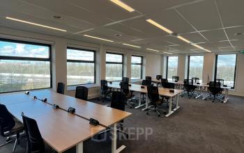Spacious office interior at George Hintzenweg 77-89, Rotterdam Alexander, featuring multiple desks and chairs suitable for office space rental with ample natural light.