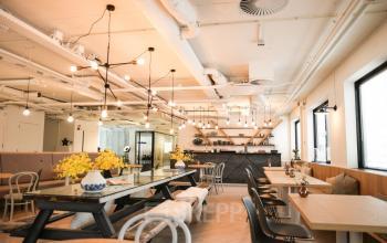 Modern office space at Marten Meesweg 8-10, Rotterdam Alexander, featuring open plan workspaces with contemporary furniture and ample natural light.