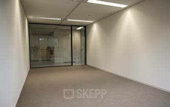 Empty office space with glass partition located at Marten Meesweg 8-10, Rotterdam Alexander.