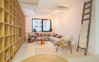 Sleek lounge area at Marten Meesweg 8-10 office to rent in Rotterdam Alexander, with cozy seating and stylish decor.