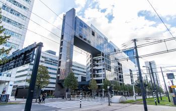 Modern office building located at Weena 290, Rotterdam Central Station, ideal for those seeking office space rental opportunities.