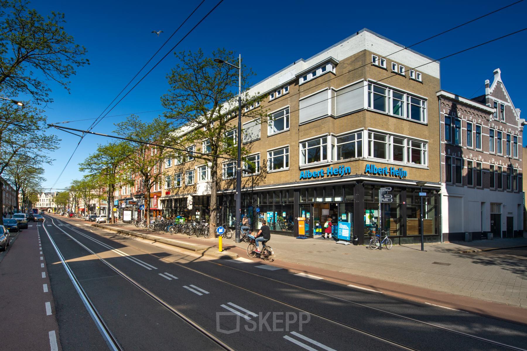 Street view of Nieuwe Binnenweg 75-77 in Rotterdam Center, showcasing the building housing office space rental opportunities with surrounding urban environment.