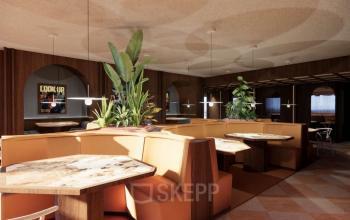 Stylish lounge area with chic marble tables and cozy booth seating, decorated with lush plants, located at Coolsingel 139, Rotterdam Center. Ideal for informal meetings and office space rental.