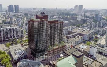 Aerial view of Coolsingel 139, a high-rise office building in Rotterdam Center. Ideal for office space rental, this location provides easy access to the city's amenities and transport links.