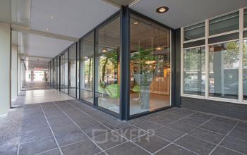 Modern office space rental at Westblaak 92, with a sleek glass facade and contemporary interior design in Rotterdam Center.