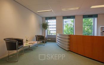 Sleek reception area at Westblaak 92, Rotterdam Center, ready for office space rental with comfortable seating and a welcoming desk.