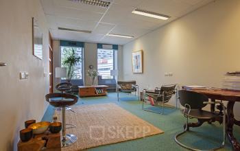 Modern office space rental at Westblaak 92, Rotterdam Center, with furnished interior and abundant natural light.