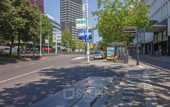 Office space rental at Westblaak 92, in Rotterdam Center, showcasing the active street view with visible landmarks.