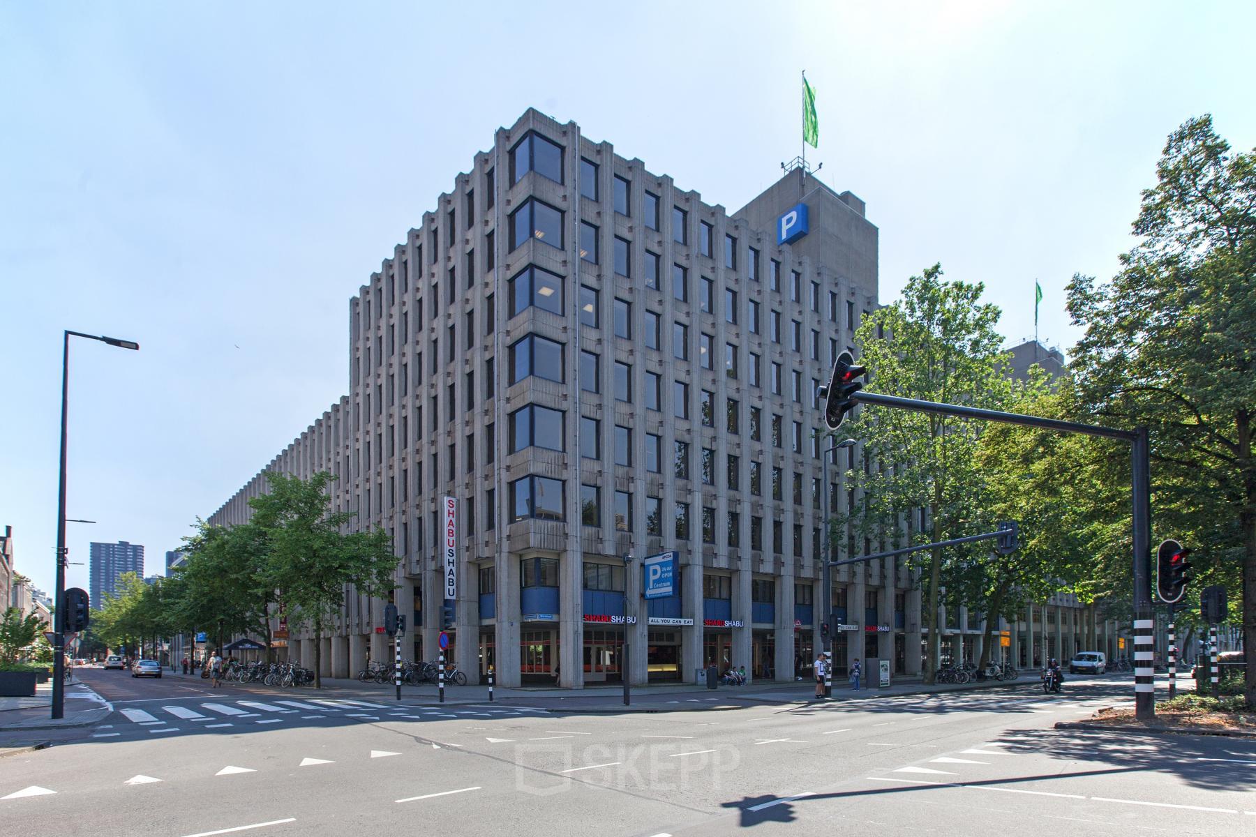 Modern Westblaak 92 office space rental in Rotterdam Center, with ample windows and a structured facade.