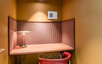 Compact furnished workspace available for office space rental at Stadhuisplein 9-23, Rotterdam Center.