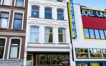 Exterior view of office building at Mauritsweg 33 A01 in Rotterdam Center, showcasing potential office space rental opportunities.