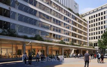 Exterior view of modern office building at Coolsingel 75, Rotterdam Center, with people walking in a business plaza, ideal for office space rental.