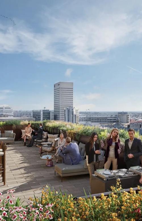 Rooftop terrace at Coolsingel 75, Rotterdam Center with people networking and enjoying a casual gathering. Ideal for office space rental events or informal meetings.