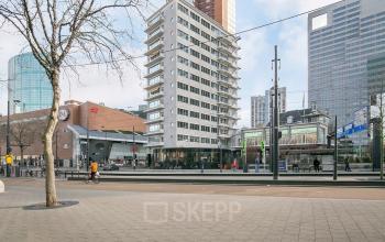 View of Coolsingel 104, Rotterdam Center showing surrounding business buildings, ideal for office space rental.