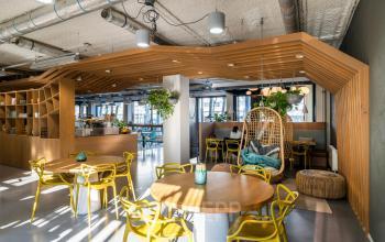 Bright and modern workspace at Westblaak 180, Rotterdam Center, featuring stylish seating and decor, ideal for office space rental.