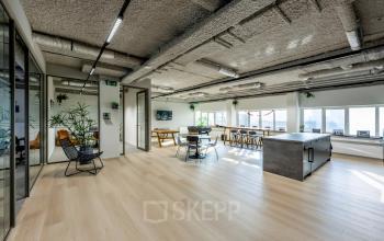 Bright open office space at Westblaak 180, Rotterdam Center, featuring modern decor and spacious work areas perfect for office space rental.