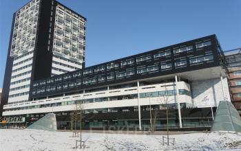Exterior of the office building located at Westerlaan 10-65, Rotterdam Delfshaven, featuring modern architecture with multiple floors of office space rental.