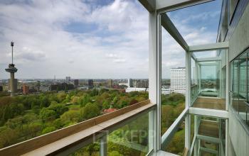 A stunning view from the balcony of an office to rent at Westerlaan 10-65, overlooking Rotterdam Delfshaven.