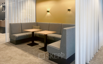Furnished office space with cozy seating area at Wilhelminakade 173, Rotterdam Kop van Zuid, perfect for informal meetings. Ideal for those looking to rent office space with comfort.