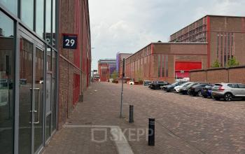 Exterior view of Scheepsbouwweg 29, Rotterdam Waalhaven, showing office buildings available for rent.