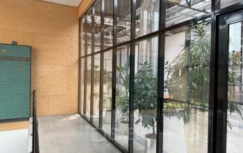 Spacious office area at Scheepsbouwweg 29 in Rotterdam Waalhaven, featuring large windows and modern industrial design, suitable for office space rental.
