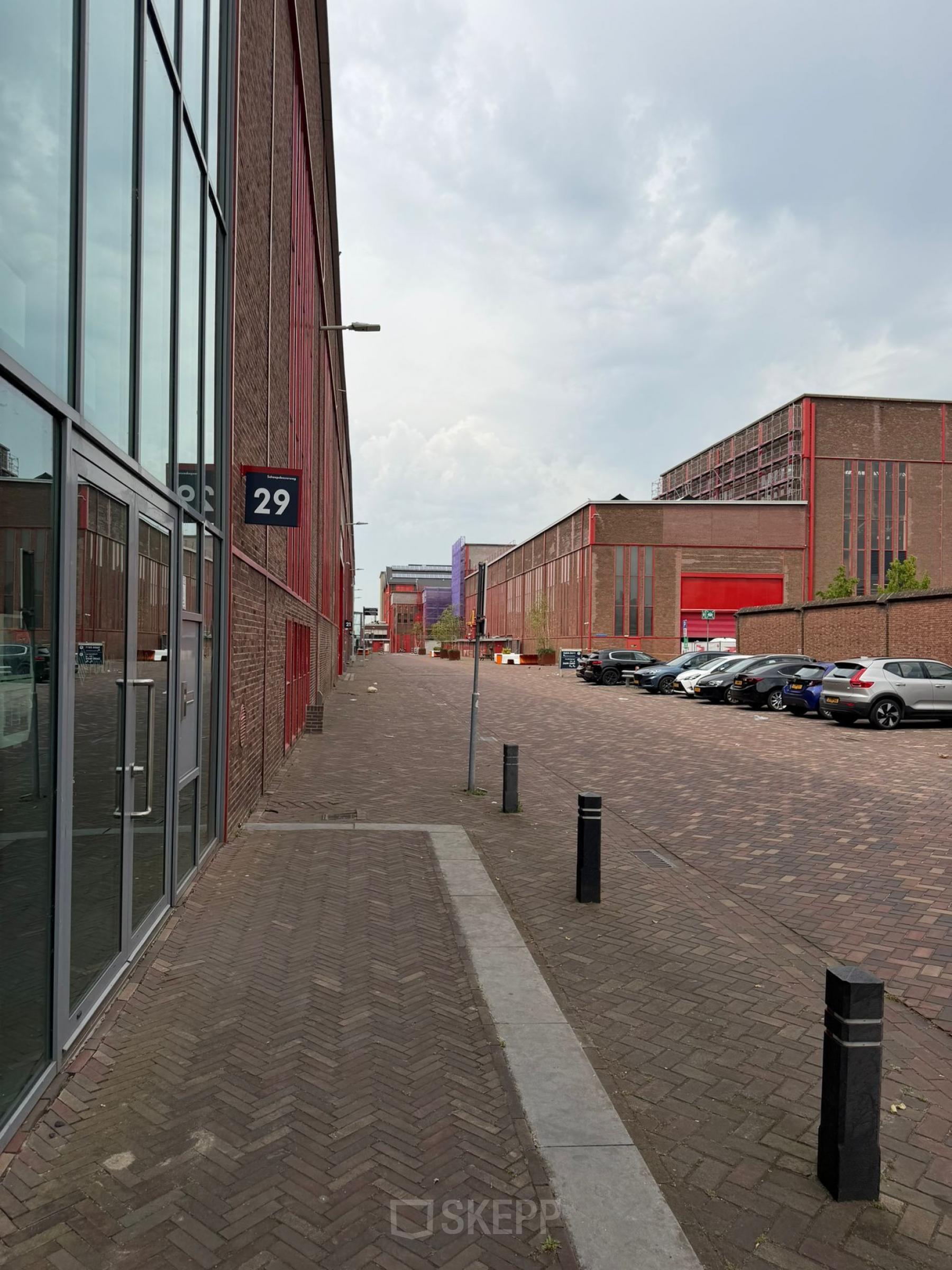 Exterior view of Scheepsbouwweg 29, Rotterdam Waalhaven, showing office buildings available for rent.