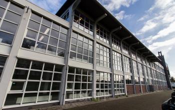 Exterior view of the office building located at Overschieseweg 34, Schiedam, available for office space rental.