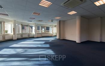 Spacious office to rent at Noordvest 18, Schiedam, with large windows and ample natural light.