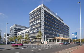 Modern office building located at Evert van de Beekstraat 104, Schiphol Airport, available for office space rental.