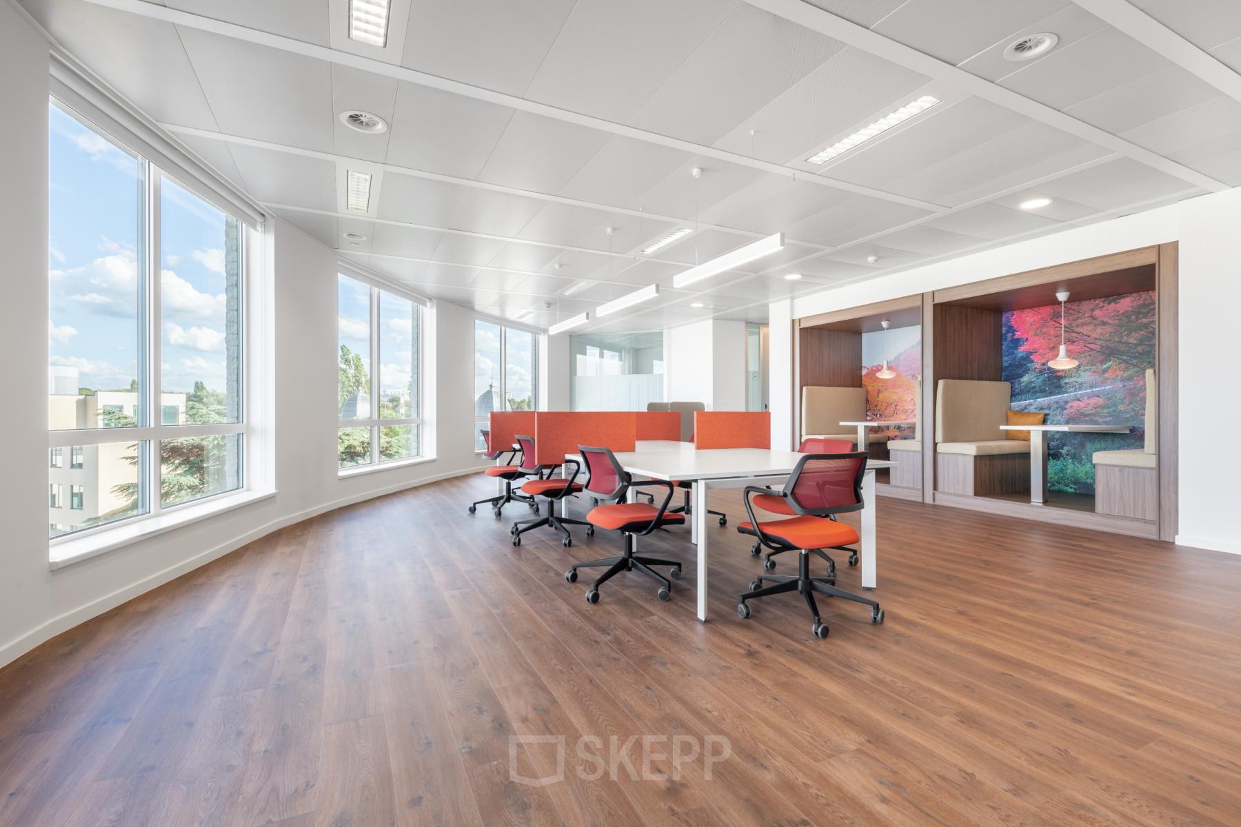 Bright office space with large windows and modern furnishings at Keizer Karellaan 584, ideal for those seeking office space rental in Sint-Agatha-Berchem.
