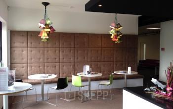 Modern office space rental at Poststraat 8, Sittard, with stylish furnishings and colorful accents for a vibrant working environment.