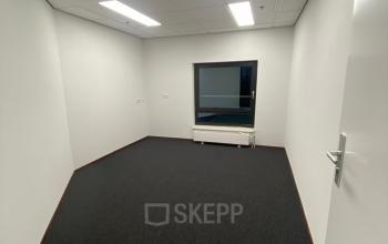 Unfurnished office space at 200 Milaanstraat, Sittard, featuring a clean layout with natural light, ideal for business professionals looking for office space rental.