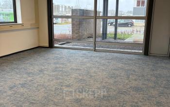 Spacious office to rent at Fischerpad 106, Sittard, featuring large windows for natural light, ideal for office space rental.