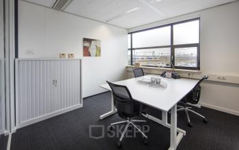 Modern office space for rent at Hart van Brabantlaan 12-16, Tilburg, with a clean design and ample natural light.