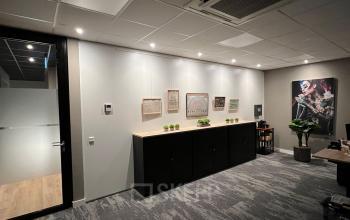 Modern office space at Kapitein Rondairestraat 8, Tilburg, featuring stylish decor and a well-organized interior for rent. Ideal for office space rental with a clean and professional environment.