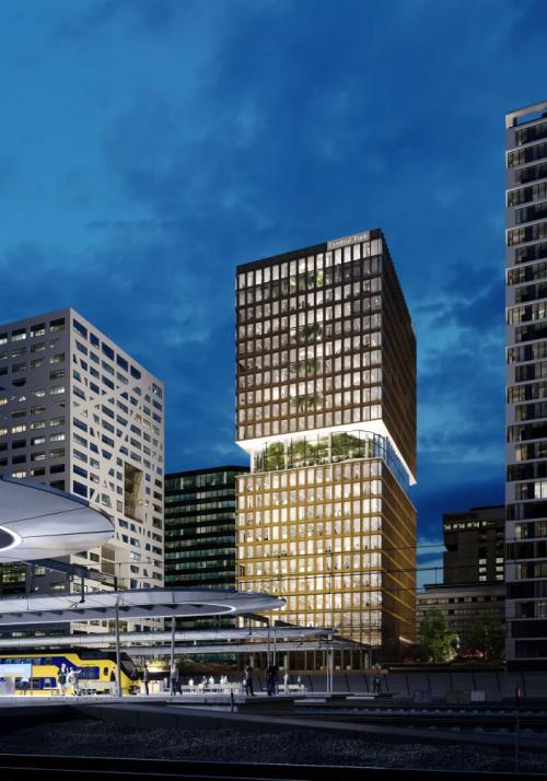 Exterior view of the office building at Stadsplateau 3, Utrecht Central Station, showcasing a modern high-rise suitable for office space rental, with a sleek glass facade and urban surroundings.