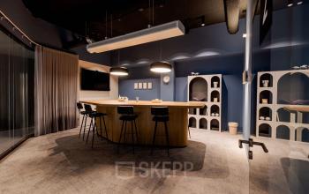 Stylish conference room at Daalsesingel 51, Utrecht Central Station, ideal for office space rental, featuring a modern table with chairs and shelves for a professional setting.