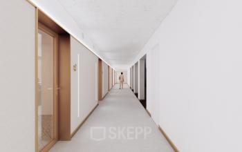 Interior hallway at Moreelsepark 1 in Utrecht Central Station, with closed doors lining both sides, suited for office space rental.