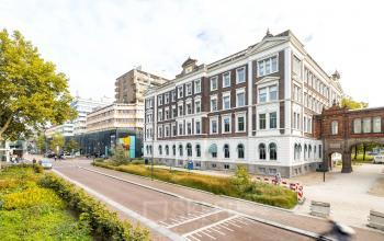 Exterior view of the office building at Moreelsepark 1, Utrecht Central Station, available for office space rental.