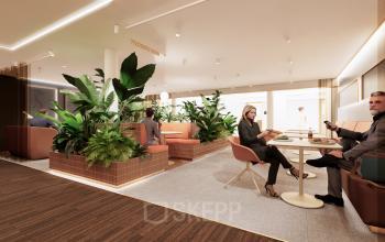 Modern workspace at Moreelsepark 1, Utrecht Central Station, featuring stylish seating areas with individuals engaged in business discussions. Ideal for those seeking office space rental.