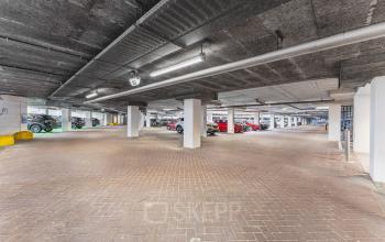 Spacious parking area at the office building on Leidseveer 2-10, Utrecht Central Station, suitable for easy access to office space rental.
