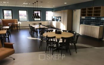 Modern office space rental at Arthur van Schendelstraat 650, Utrecht Central Station with stylish furnishings and ample natural light.