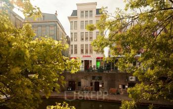 Exterior view of an office building at Oudegracht 161, Utrecht Center, suitable for office space rental.