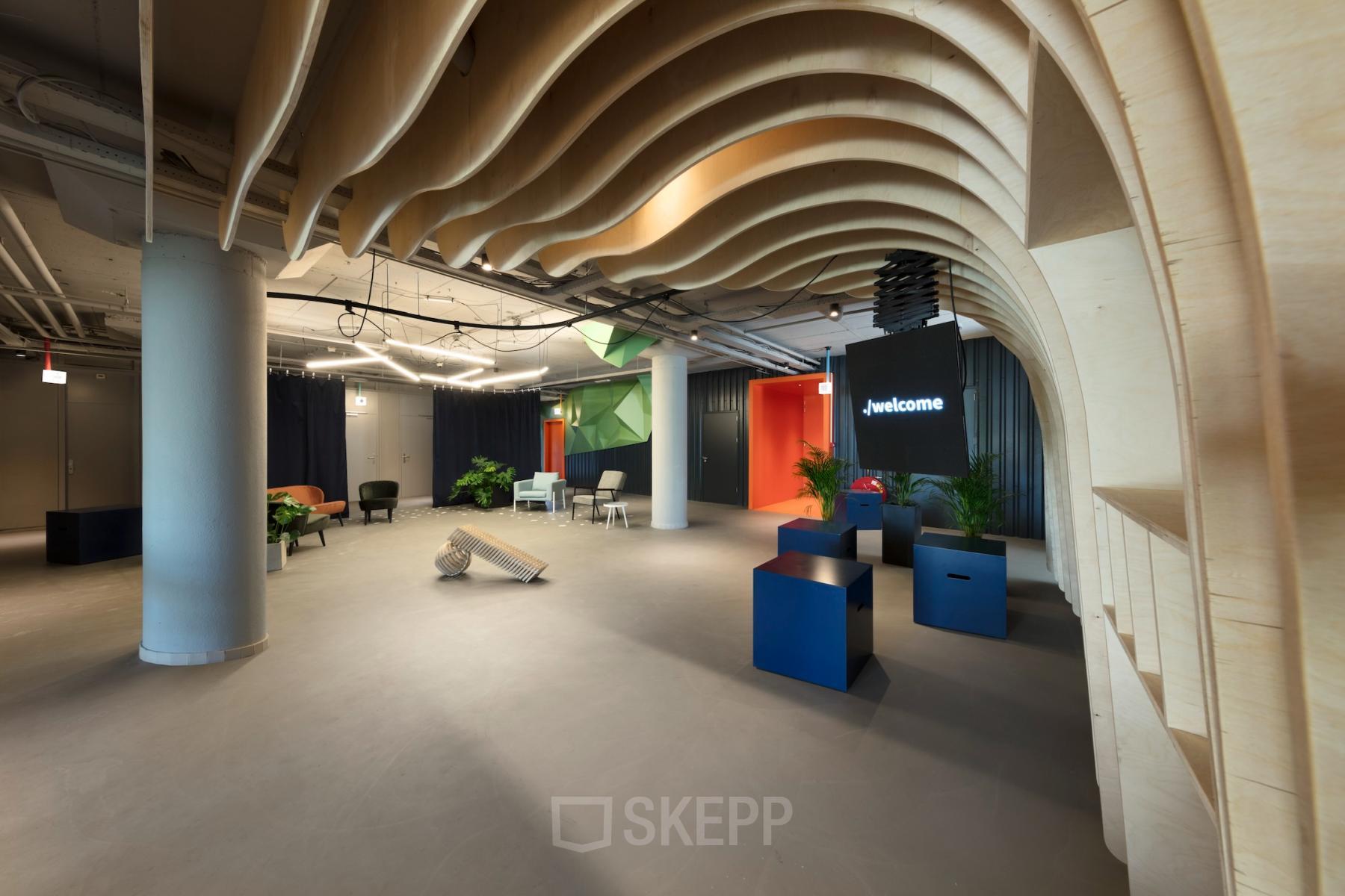 Modern office interior at Europalaan 100, Utrecht Kanaleneiland, with unique ceiling design and contemporary furnished workspaces highlighting office space rental.