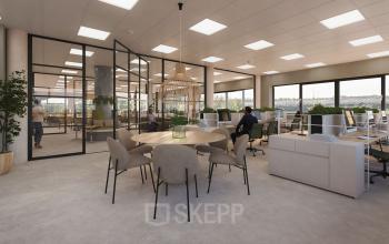Open-plan office at Zonnebaan 45, Utrecht Lage Weide, featuring modern workspaces with people engaged in business activities. Ideal office space rental for professionals seeking a collaborative environment.