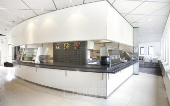 Modern pantry in the office at Zwarte Woud 2, Utrecht Lunetten, Utrecht, featuring sleek countertops and bright lighting, part of the office space rental.